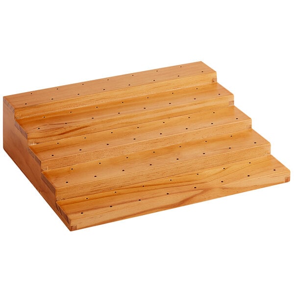 An Acopa Mesa dark brown wooden shelf with 75 holes.