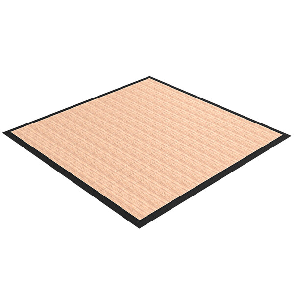 A square light wood plank dance floor made of EverBlock Flooring panels with a black border.