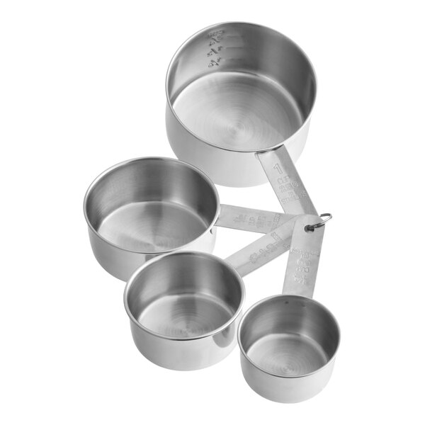 A set of four stainless steel measuring cups connected by a metal ring.