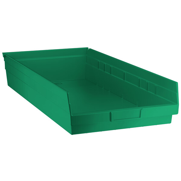 A green plastic Regency shelf bin.