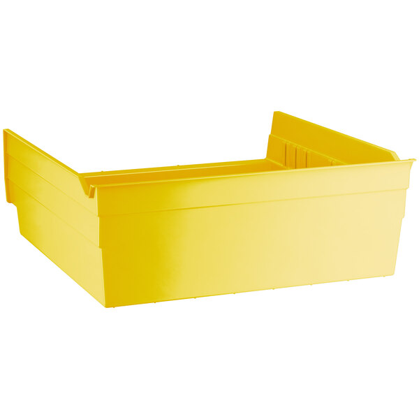 a yellow plastic box with a lid