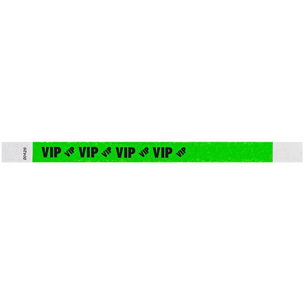 A neon green wristband with black text reading "VIP" on a green strip.