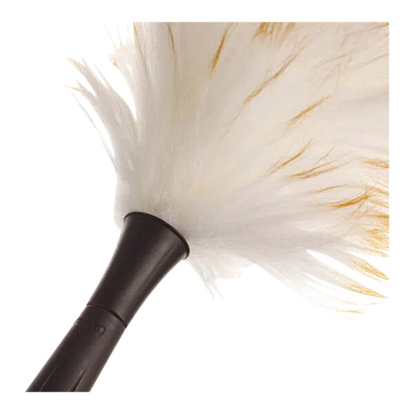 A lambswool duster with a black handle and soft, fluffy white fibers.