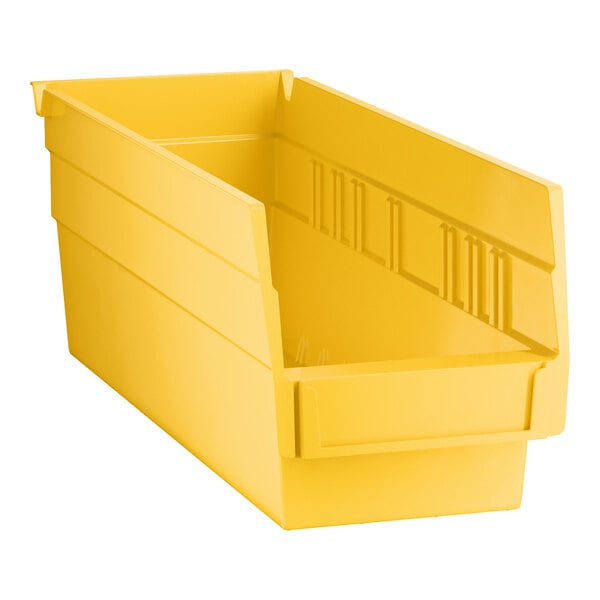 A yellow plastic shelf bin with an open front and ribbed sides.