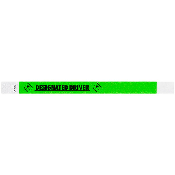 A neon green Carnival King Tyvek wristband with black text that says "DESIGNATED DRIVER."