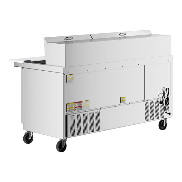A Beverage-Air stainless steel commercial refrigerator with drawers on wheels.