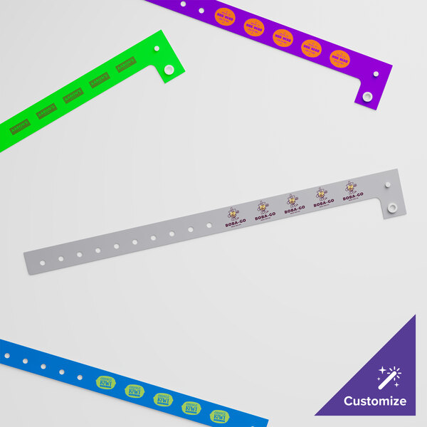 A group of silver plastic Carnival King wristbands.