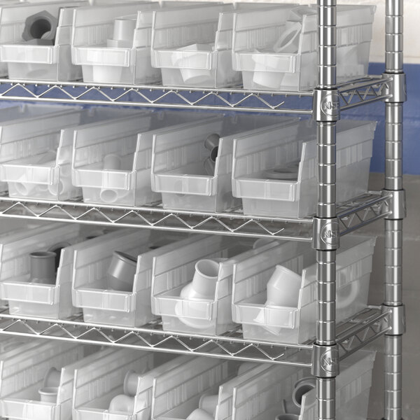 A white plastic shelf bin from Regency on a metal shelf.