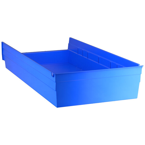 A blue plastic container with two compartments and a lid.
