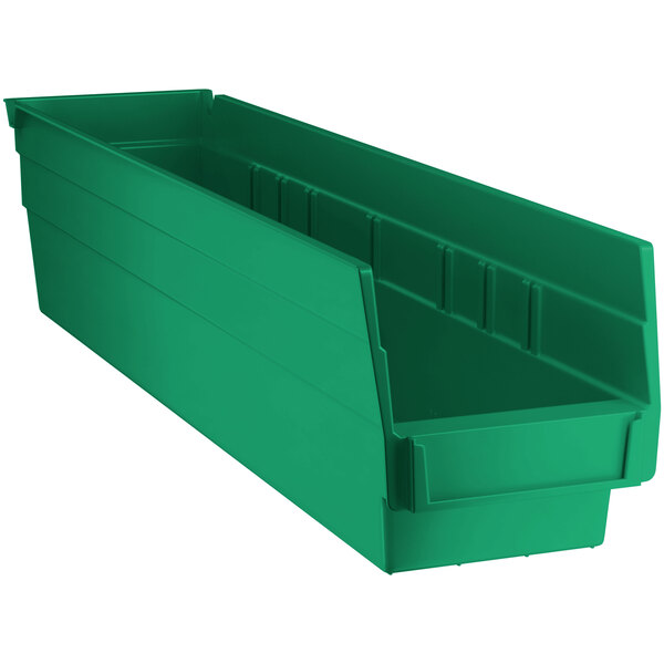 a green plastic bin with a white background