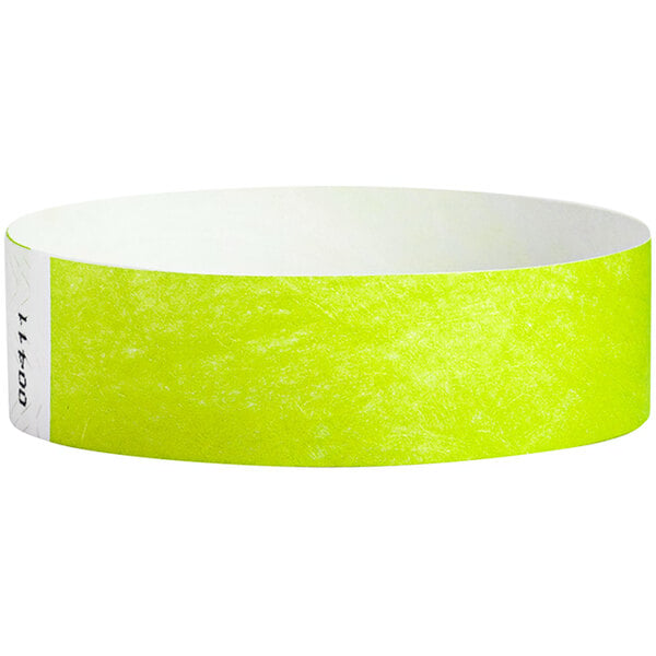 A yellow Carnival King paper wristband with white text.