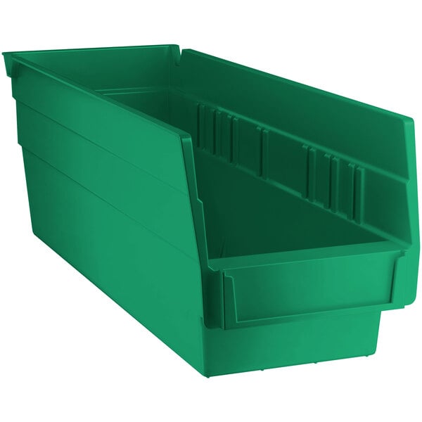 A green plastic Regency shelf bin.