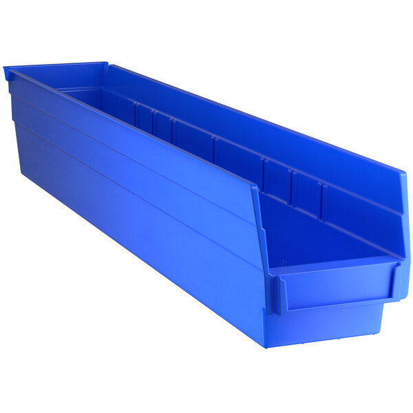 A blue Regency plastic shelf bin with two compartments.