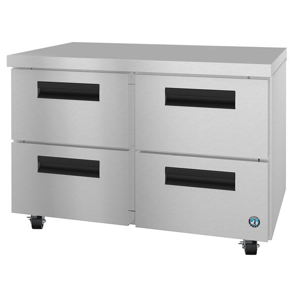 a metal cabinet with drawers on wheels