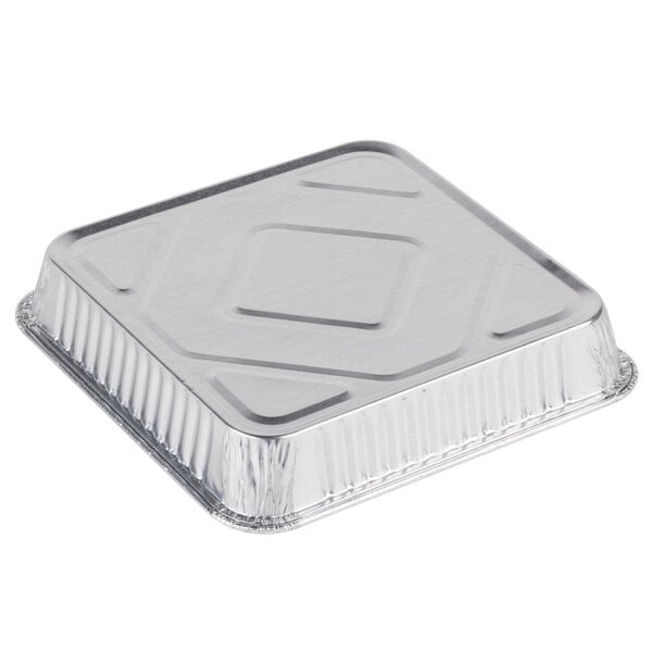 An 8" square silver foil cake pan.