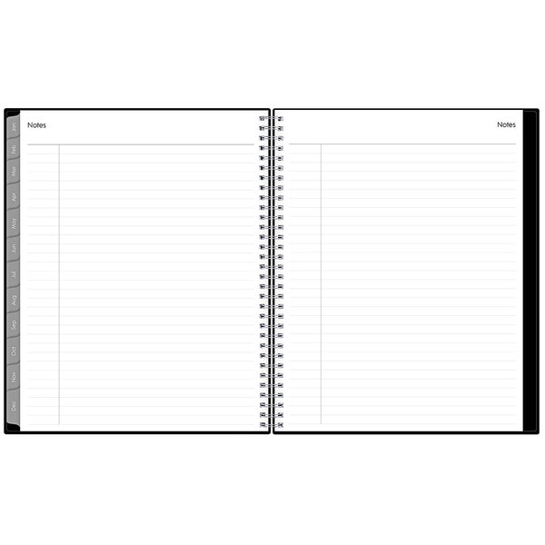 A blue spiral bound Blue Sky weekly/monthly planner with white pages.