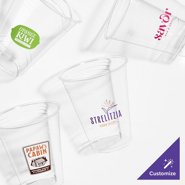 A close-up of a clear Dart polypropylene plastic cup.