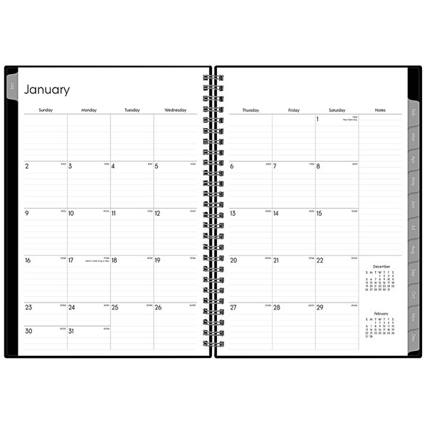 A spiral bound Blue Sky monthly planner for January 2024 - December 2024 with black text on a white background.