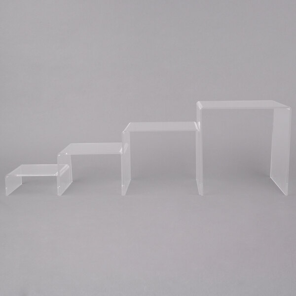 A set of clear acrylic display risers.