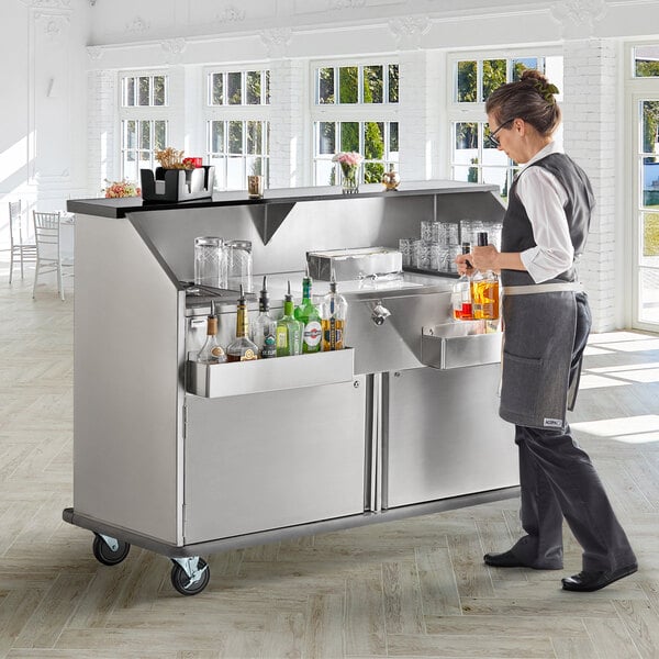 Regency 63" Standard Stainless Steel Portable Bar with Two Removable Speed Rails, Ice Bin, and Removable Ice Bin Cover