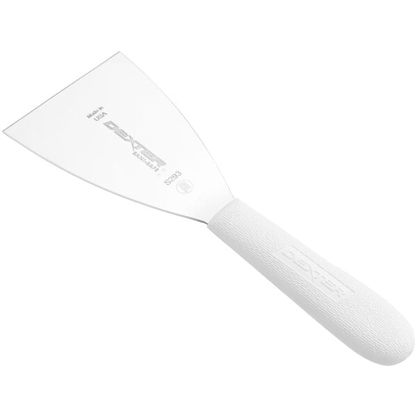 A white Dexter-Russell grill scraper with a white handle.