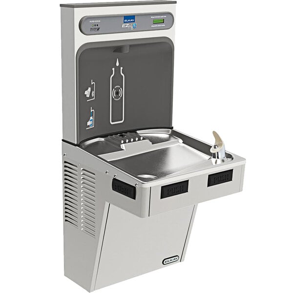 a water fountain with a bottle and a water dispenser