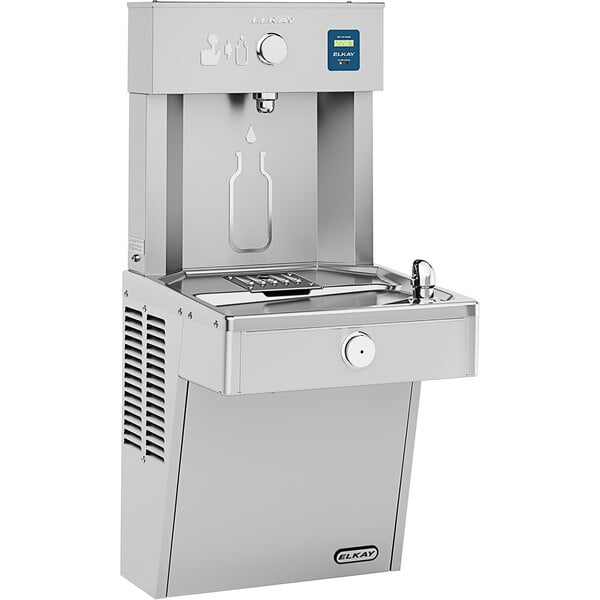 An Elkay stainless steel water fountain with a bottle filler on the side.