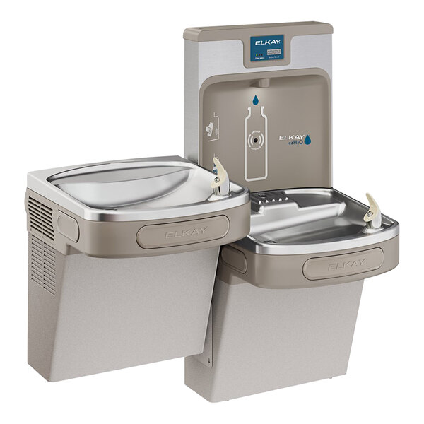 A Zurn Elkay light gray bottle filling station and drinking fountain with a faucet.