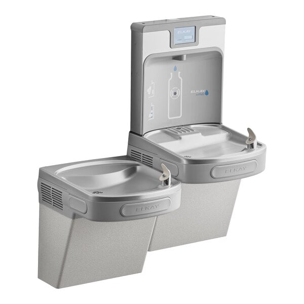 A bi-level light gray drinking fountain with a hands-free filtered bottle filling station and vandal-resistant features.