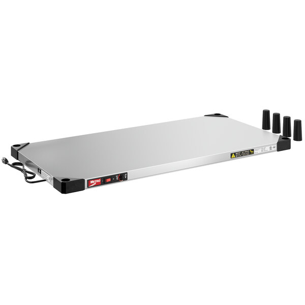 A silver rectangular Metro countertop shelf warmer with black knobs.