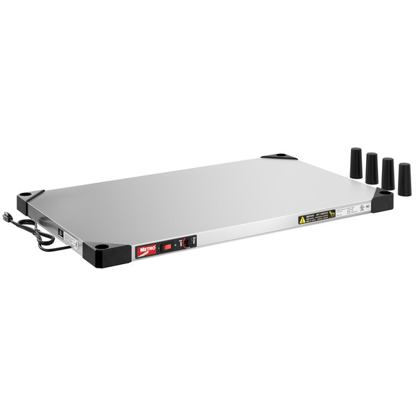 A silver rectangular Metro countertop shelf warmer with black plugs.