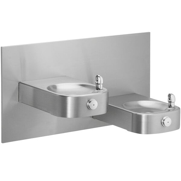 An Elkay stainless steel wall mount drinking fountain with two levels.