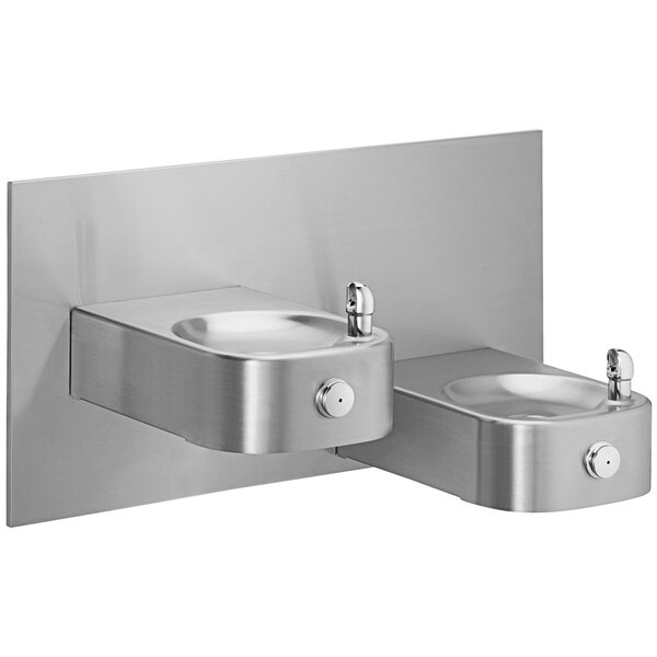 An Elkay stainless steel reverse bi-level wall mount drinking fountain with two taps.