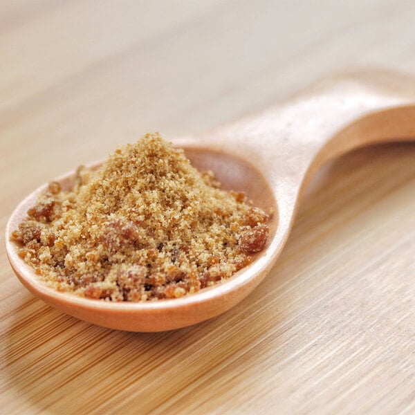 A spoonful of Panela sugarcane powder.