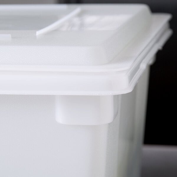 A white Rubbermaid polyethylene lid on a white plastic container.