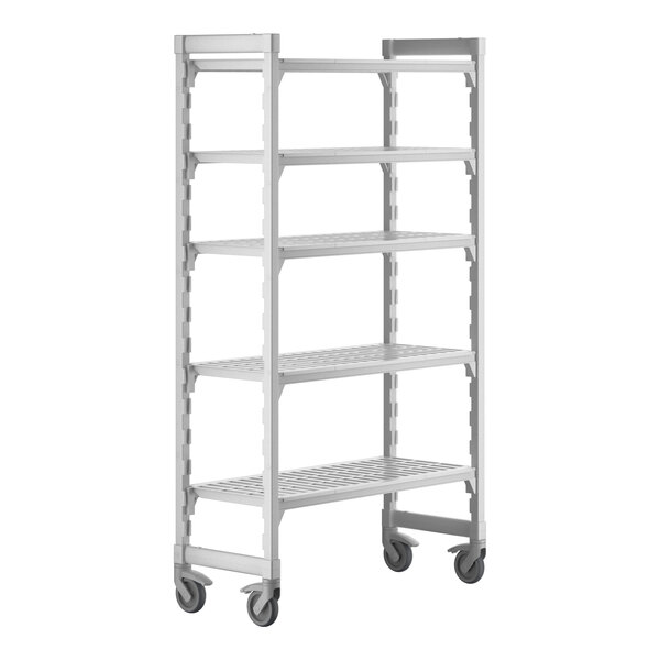 A white plastic Cambro Camshelving Premium mobile shelving unit with 5 shelves and wheels.