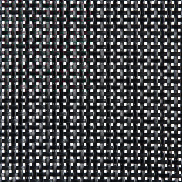 A close-up of a black and white woven fabric with white dots.