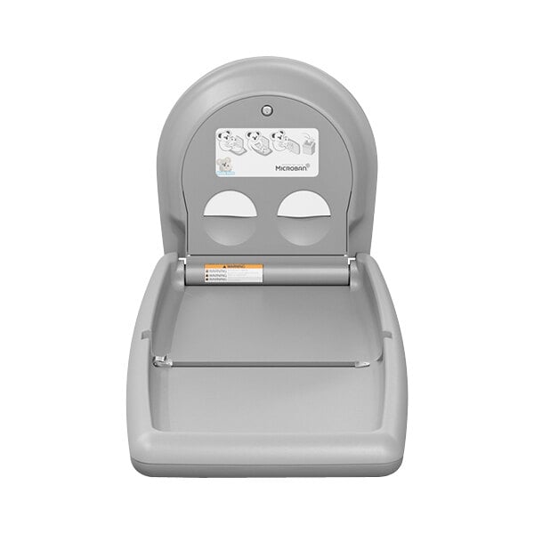 A grey Koala Kare baby changing table with a stainless steel inset.