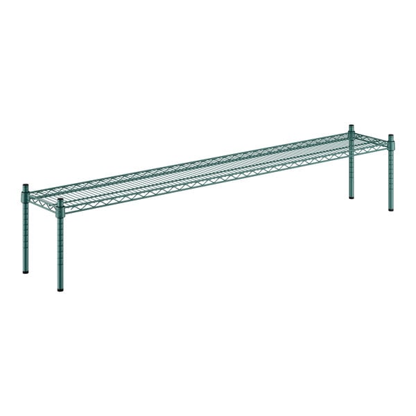 A Regency green metal shelf with metal legs.