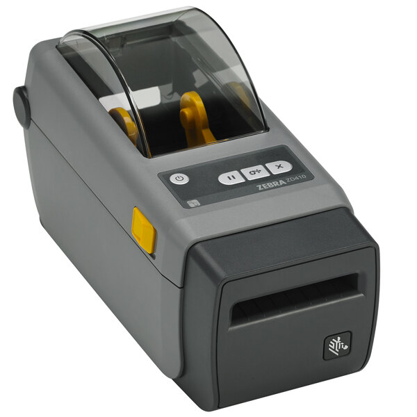 A grey and black Zebra ZD410D barcode printer with a clear cover.