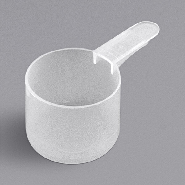 a clear plastic bowl with a white handle