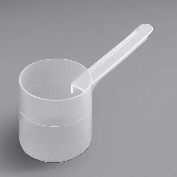 A clear plastic polypropylene scoop with a long handle.