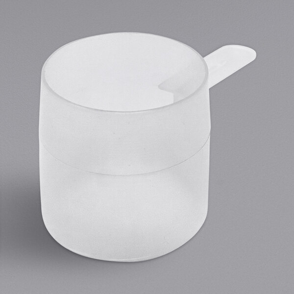 A white plastic scoop with a long handle.