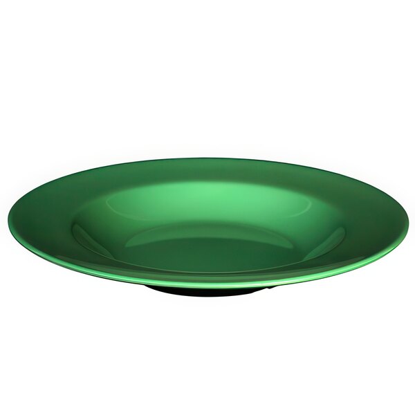 A green bowl with a white interior and curved edges.