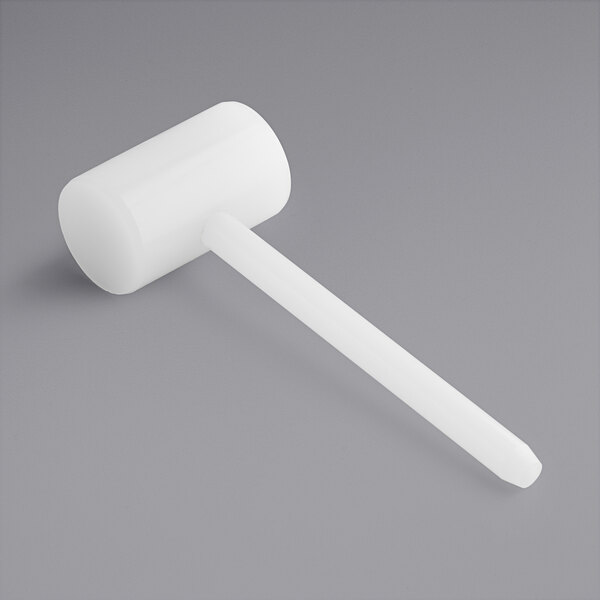 A white plastic meat tenderizer with a long handle.