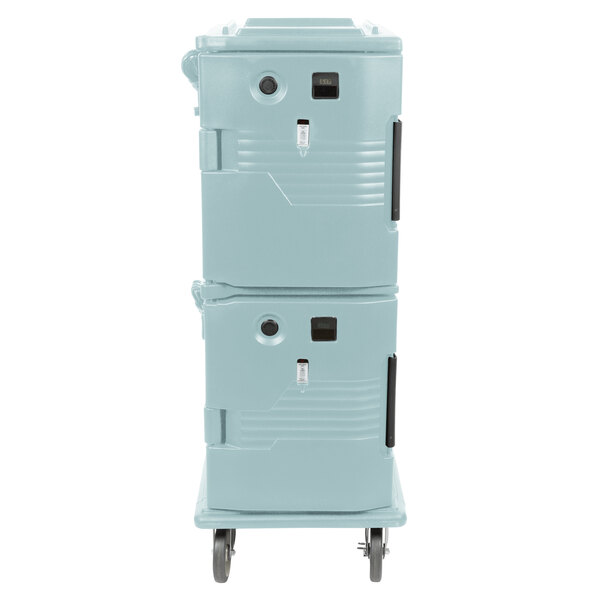 A close-up of a blue Cambro Ultra Camcart on wheels.