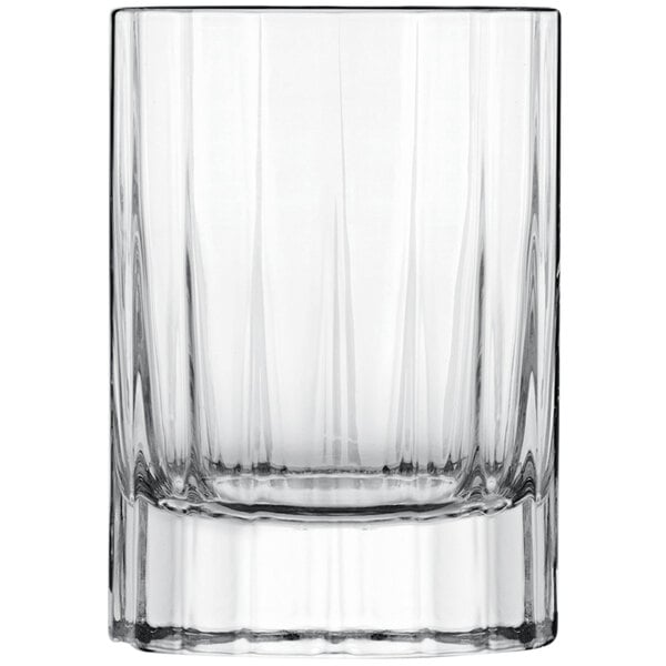 A clear Luigi Bormioli liqueur glass with a thin rim.