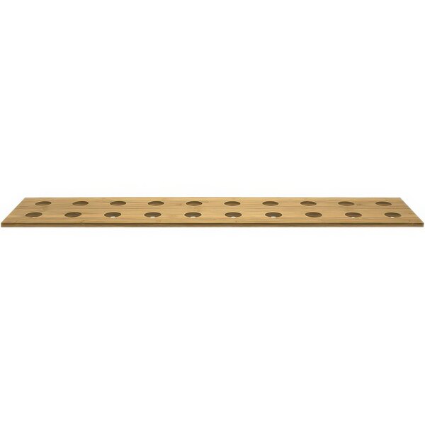 A wooden board with holes for cones on it.