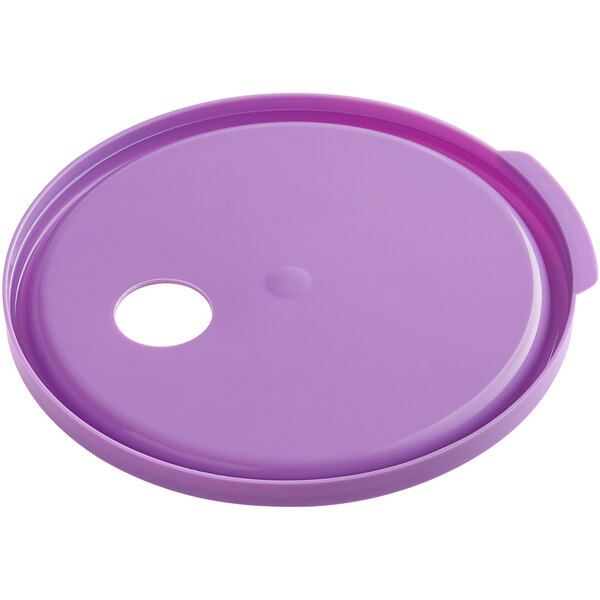 A round purple plastic lid with a hole.