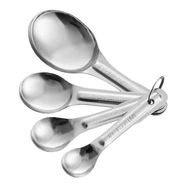 A set of four stainless steel measuring spoons connected by a metal ring.